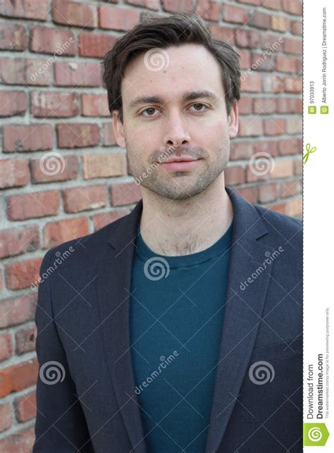 Striking Businessman With Neutral Expression Close Up Stock Image