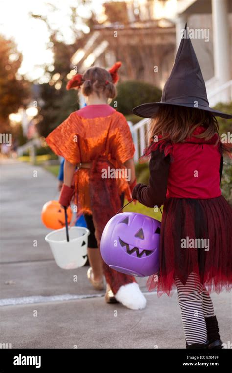 Children Going Trick Or Treating Stock Photo Alamy