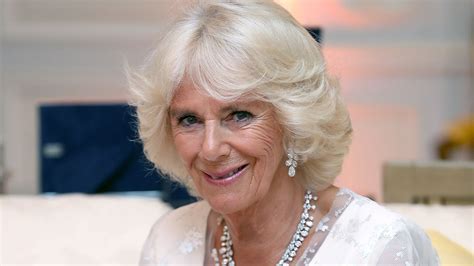 The Duchess Of Cornwall Stuns In White Fiona Clare Gown As She Mingles