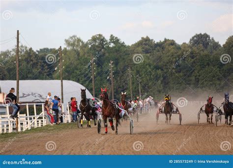 Horses And Riders Running At Horse Races Stock Image Image Of Harness