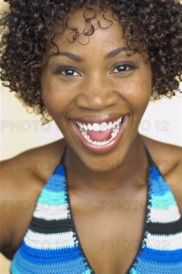 Close Up Of African Woman Laughing Photo12 Tetra Images Karin Dreyer