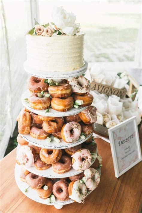 Donut Tower Wedding Cake In White And And Soft Pinks Wedding Donuts Wedding Desserts Wedding