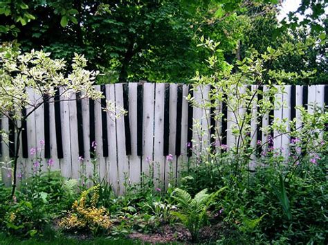 Accent your yard with sturdy wood fencing products, available in a variety of unique styles. 15 Unique garden fencing ideas - Wood picket fence panels