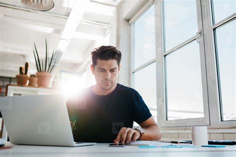 Busy Young Man Working In Office Stock Photo 125510 Youworkforthem