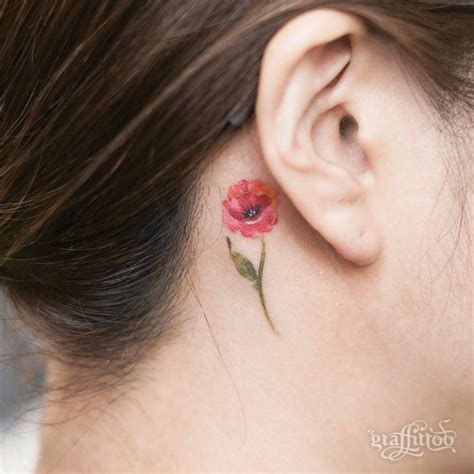 Beguiling Flower Tattoo On The Ear Easy Flower Tattoos Easy Tattoos