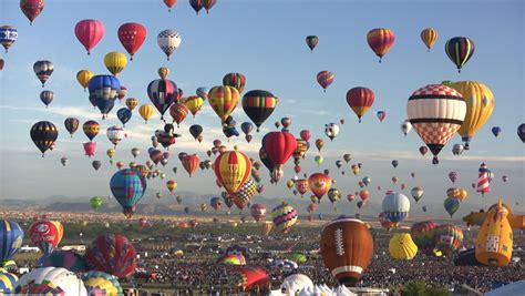 The Balloon Park Field With Crowd Visible And Many Balloons Filling The