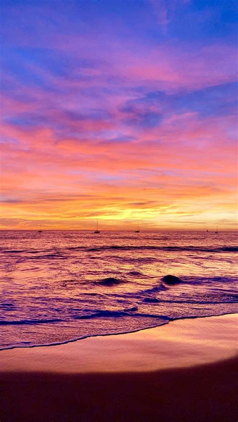 Download Colorful Sunset At The Beach Wallpaper