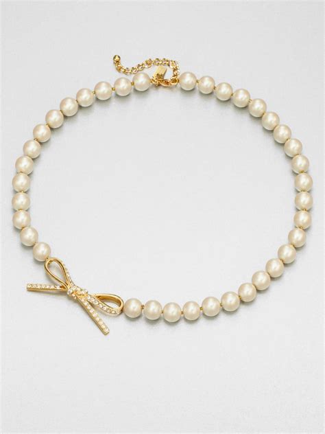 Kate Spade Faux Pearl Bow Necklace In Cream Natural Lyst
