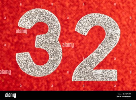 Number Thirty Two Silver Color Over A Red Background Anniversary