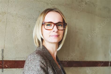 Close Up Portrait Of Yong 35 Year Old Woman Wearing Brown Eyeglasses