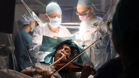 Woman Plays Violin While Surgeons Remove Tumour From Her Brain Uk