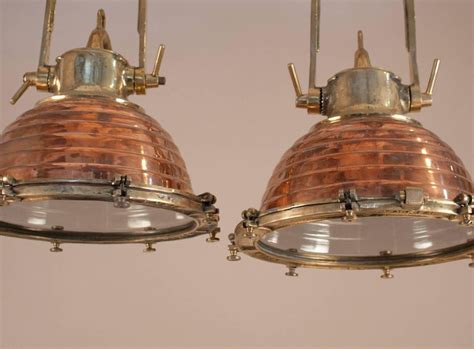 Maybe you would like to learn more about one of these? Pair of Copper and Brass Nautical Pendant Lights at 1stdibs