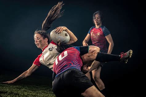 Female Rugby Player Getting Tackled Fotografie Stock E Altre Immagini