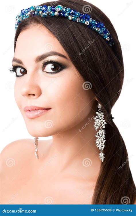 Portrait Of Beautiful Brunette Woman With Big Earring And Shinny Accessories In Hair Perfect