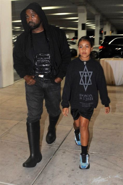Kanye West Slips On Balenciaga Boots For Shopping With North West