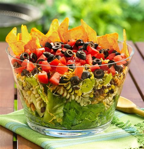 Mexican rice makes for a fantastic side dish, a base for burrito bowls, or a delicious filling for burritos or chimichangas. Layered Mexican Party Salad - a photo on Flickriver