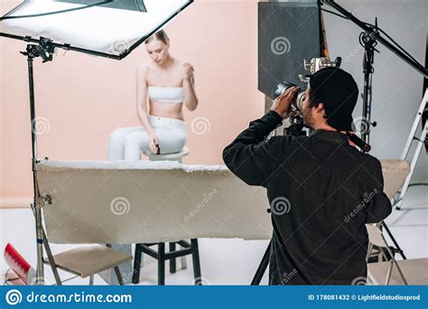Videographer With Camera Filming Beautiful Model Stock Photo Image Of