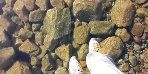 Watch These Hikers Walk Across A Crystal Clear Frozen Mountain Lake In