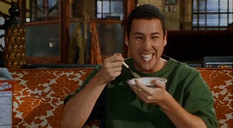 adam sandler laughing with bowl milk spilling out mouth elfa82