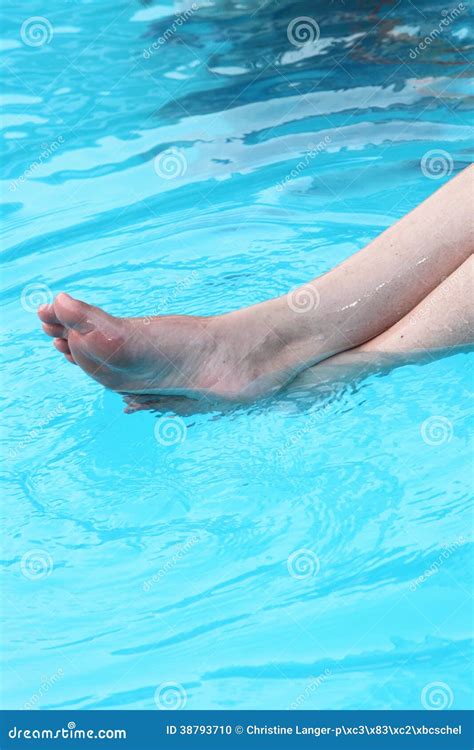 Bare Feet Of A Person Relaxing In Cool Blue Water Stock Photo Image Of Travel Pleasure