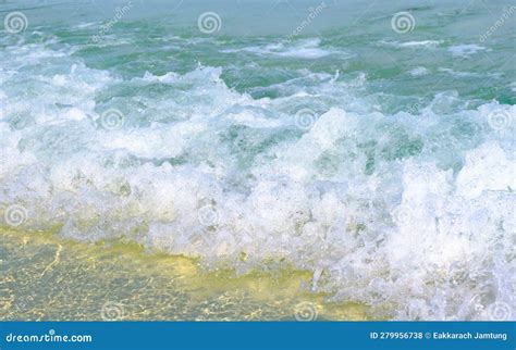 The Sea Waves Hit The Sandy Beach The Sea Is Beautiful Stock Photo