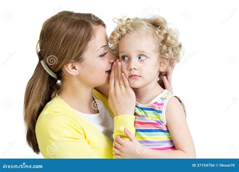 Mom And Daughter Sharing A Secret Whispering Royalty Free Stock Image