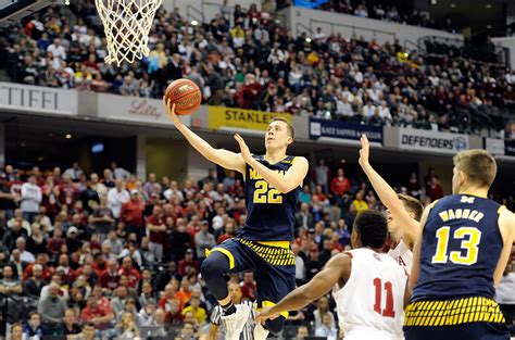 Miami heat forward duncan robinson will enter restricted free agency this offseason, and espn's adrian wojnarowski. At Michigan, Duncan Robinson Finds a New Role and a Bigger ...