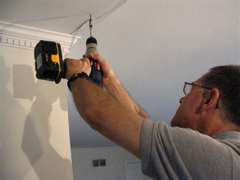 I put mud on the plate and taped it on the ceiling. How to Cover a Ceiling Crack | how-tos | DIY