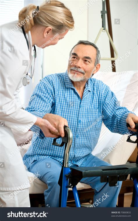 Doctor Nurse Helps Senior Patient Get Stock Photo 70800832 Shutterstock