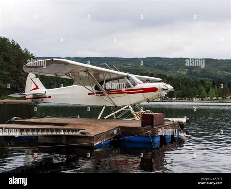 Small Float Plane Parking At A Landing Stage Of A Lake Stock Photo Alamy