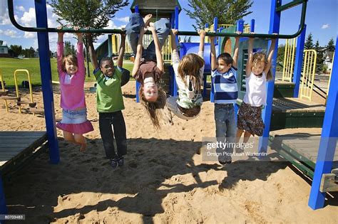 Group Of Children Playing In A Park High Res Stock Photo Getty Images