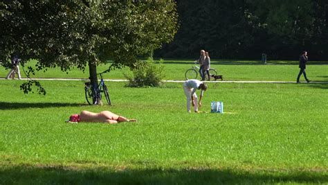 Munich Germany 2010s People Sunbathe Naked Stock Footage Video 100