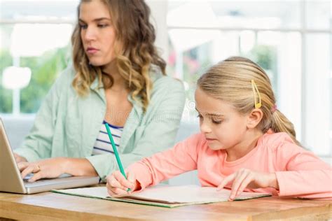 Mother And Daughter Working Stock Image Image Of Happy Concentrated