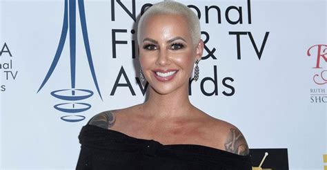 The Meaning Behind Amber Roses Massive Forehead Tattoo Revealed