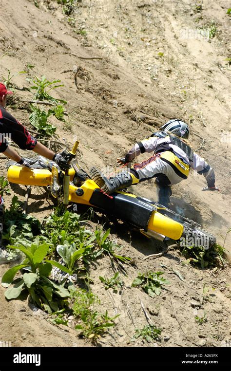 Contestants Of All Ages Compete In A Motorcycle Hill Climb Race Stock