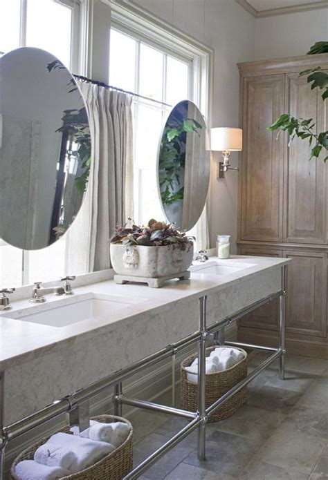 Special mirrors for wet rooms are especially good. Mirrors hung over windows | Bath Design | Pinterest | Mirror, Window and Round Mirrors