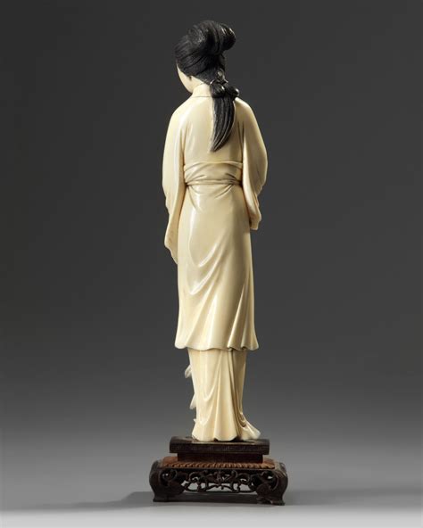 A Chinese Ivory Carving Of A Lady Oaa