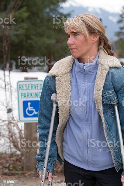 Disabled Woman On Crutches Stock Photo Download Image Now Adult