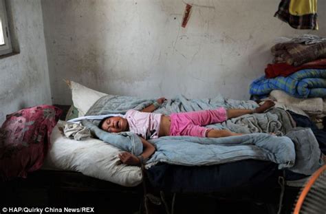 Shocking Images Of Chinese Girl Tied To Her Bed By Her Own Mother