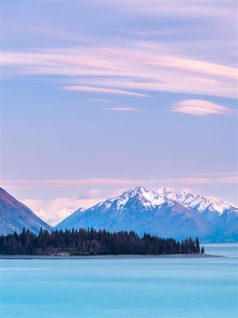 1668x2224 Resolution Cloudy Mountains In Lake Tekapo New Zealand