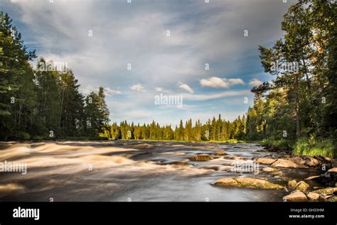 Fast Moving River In Finish Lapland Stock Photo Alamy