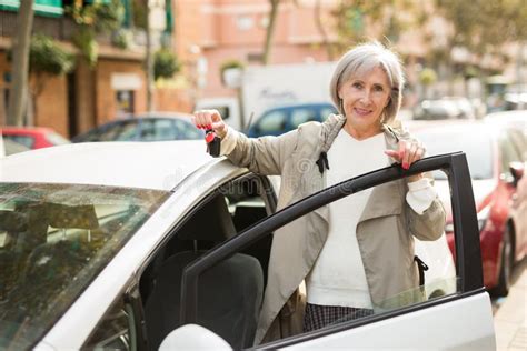 Mature Lady Standing Beside Car Stock Image Image Of Outdoors