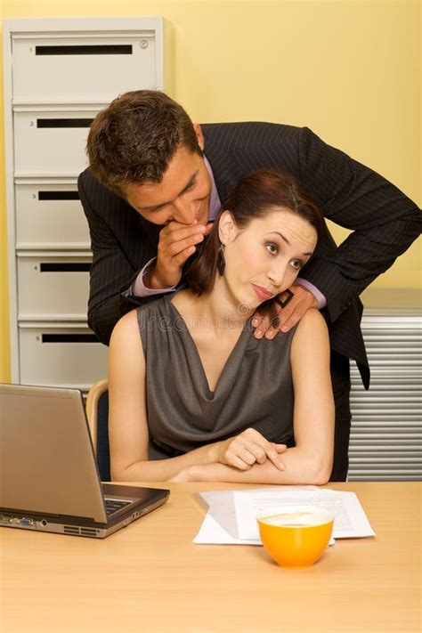 Businessman Flirting With Businesswoman In Office Stock Photo Image