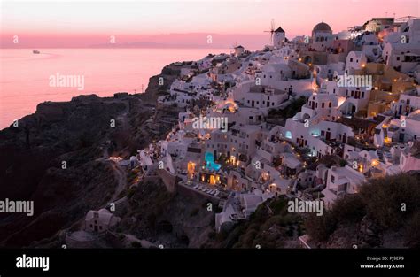 The Famous Oia Village On Santorini Island At Sunset Greek Cyclades