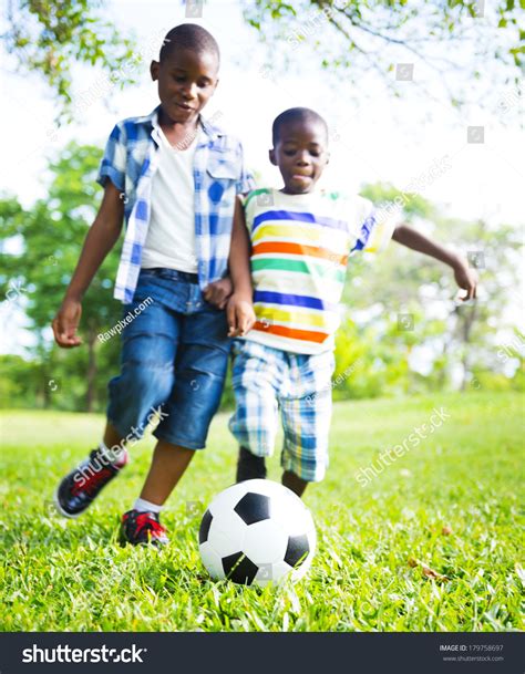 African Children Playing Ball In The Park Stock Photo 179758697