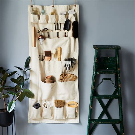 Canvas Pocket Wall Organizers Make Tidying Up Less Of A Chore And More