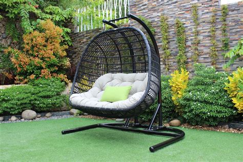 The perfect addition for when the weather starts to get warmer and family gatherings in the garden become a frequent occurrence. Renava San Juan Outdoor Black & Beige Hanging Chair - Outdoor