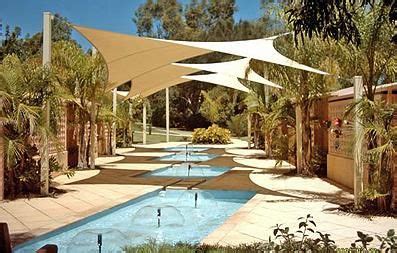 The customer has to cut out, fold and glue the parts together. Do It Yourself Weddings: Draping Ceilings for the DIY Bride | Outdoor shade, Shade sail, Pool shade