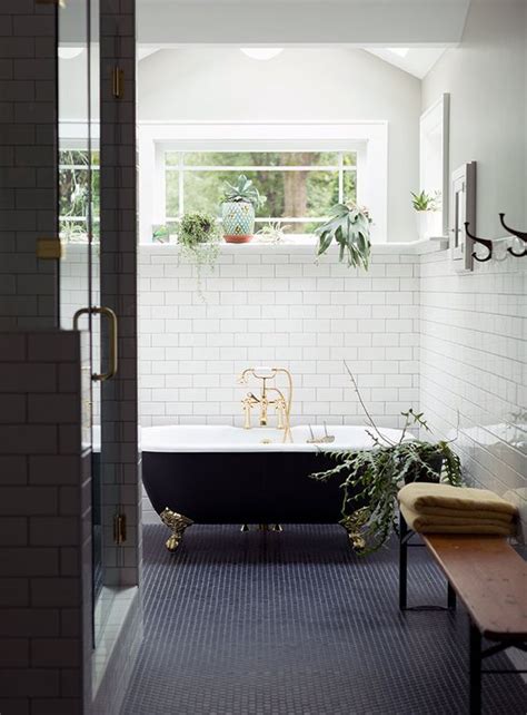 You can edit any of drawings via our online image editor before downloading. navy tiles, black clawfoot tub, and white subway tile