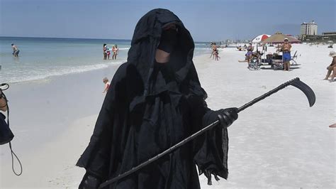 Grim Reaper Protests Florida Beaches Reopening Amid Coronavirus Crisis